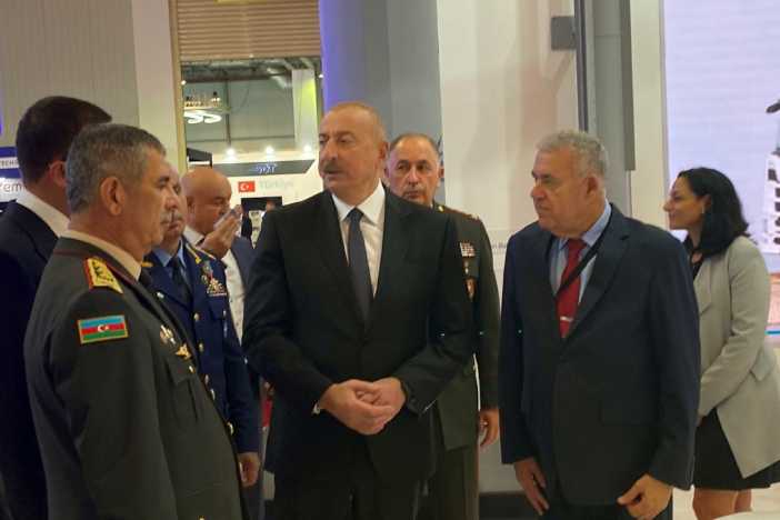 Ilham Aliyev at IAI pavilion.