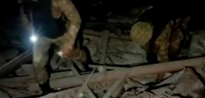 Pakistan Army Soldiers Inspecting Debris of a Terror Camp Following India's Military Strike.